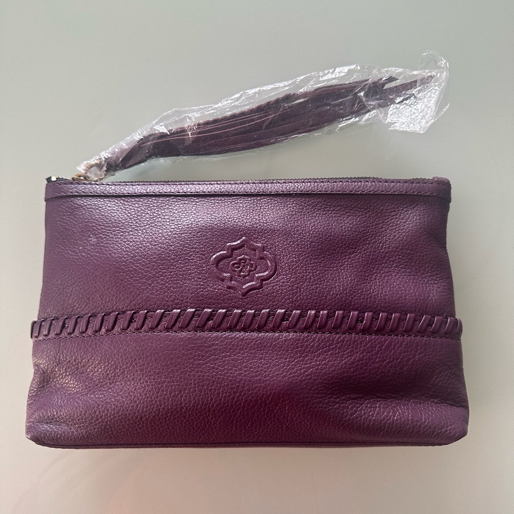 New ~ orYany Women Clutch Pouch Wristlet Plum Leather with a Tasseled Strap
